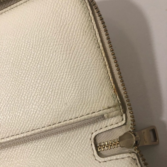 Coach debossed creamy white double zipper wristlet